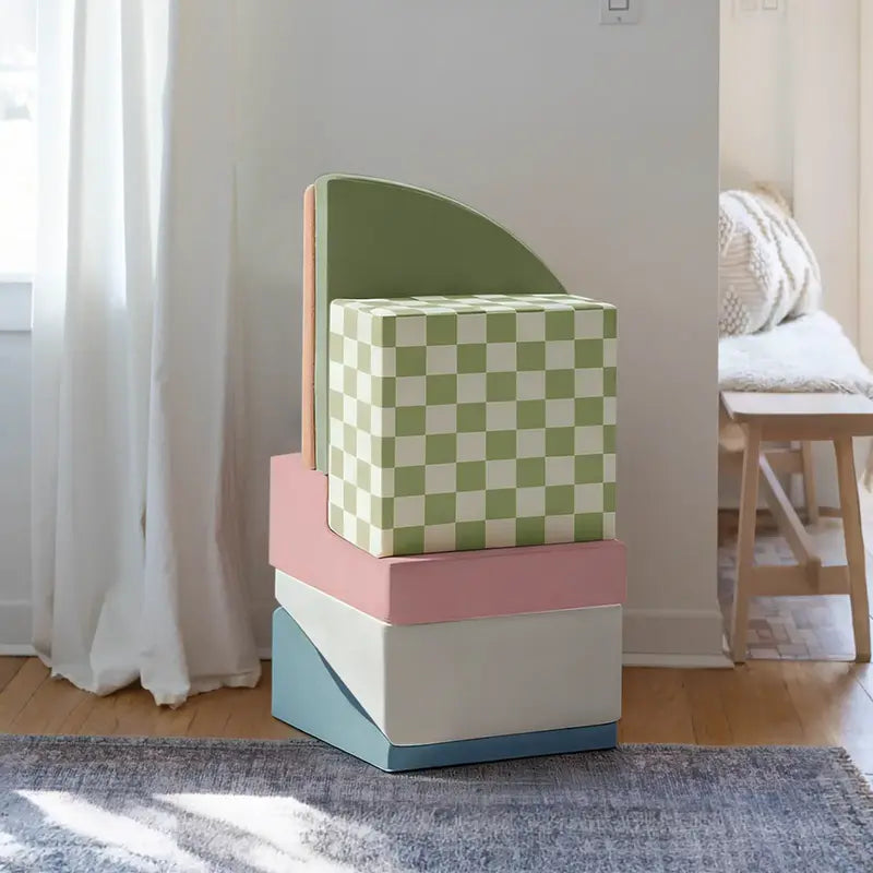 Tiny Land® PlayNest Climbing Blocks - Morandi – six Morandi foam pieces stacked beside a curtain