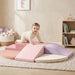 Tiny Land® PlayNest Climbing Blocks - Violet – child crawling across the Violet foam blocks in a playroom