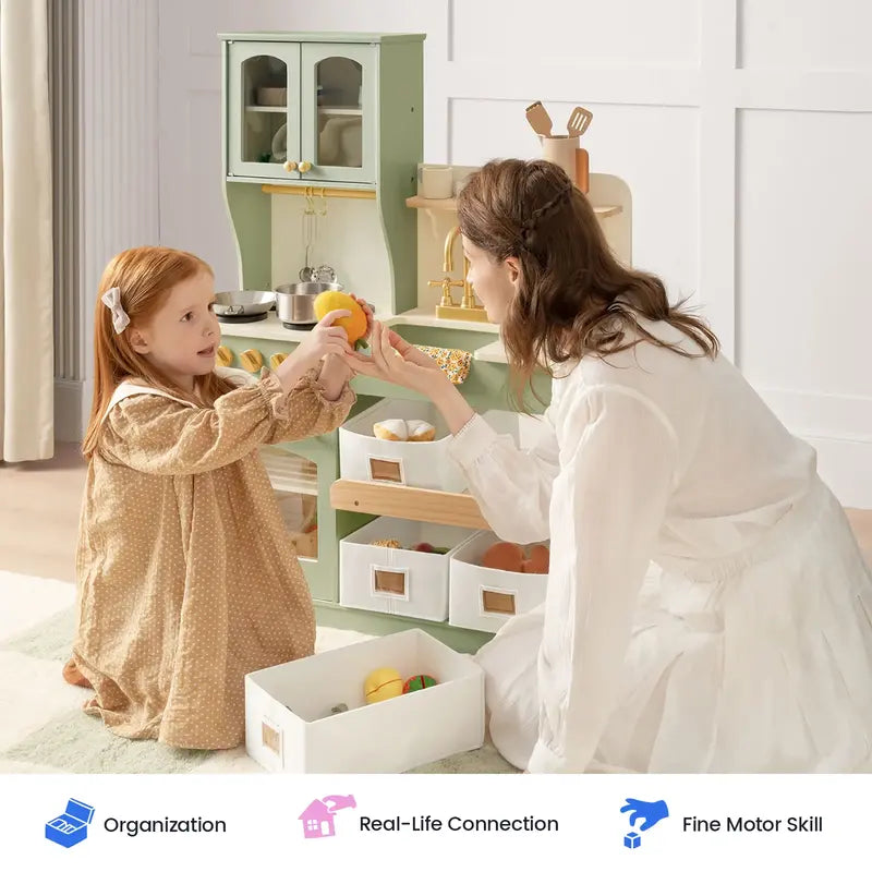 Tiny Land® Wooden Play Kitchen with Storage for Creative Toddlers – Parent and child sharing pretend food beside the Sage kitchen