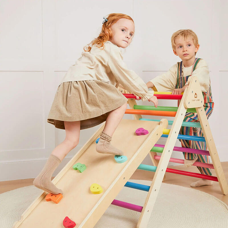 TIny land Pikler triangle with kids climbing
