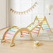 Tiny land Pikler triangle with rainbow colors in a playroom