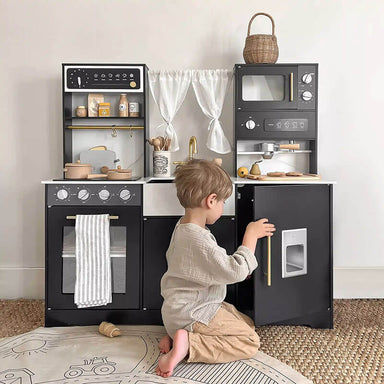 tiny_land_play_kitchen_black_full_set_boy_playing