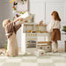 tiny land play kitchen in cream with kids playing
