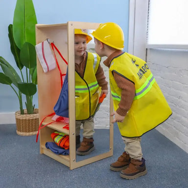 Toddler Dress Up Center WB0880 – Child looking into the mirror while wearing dress-up clothes