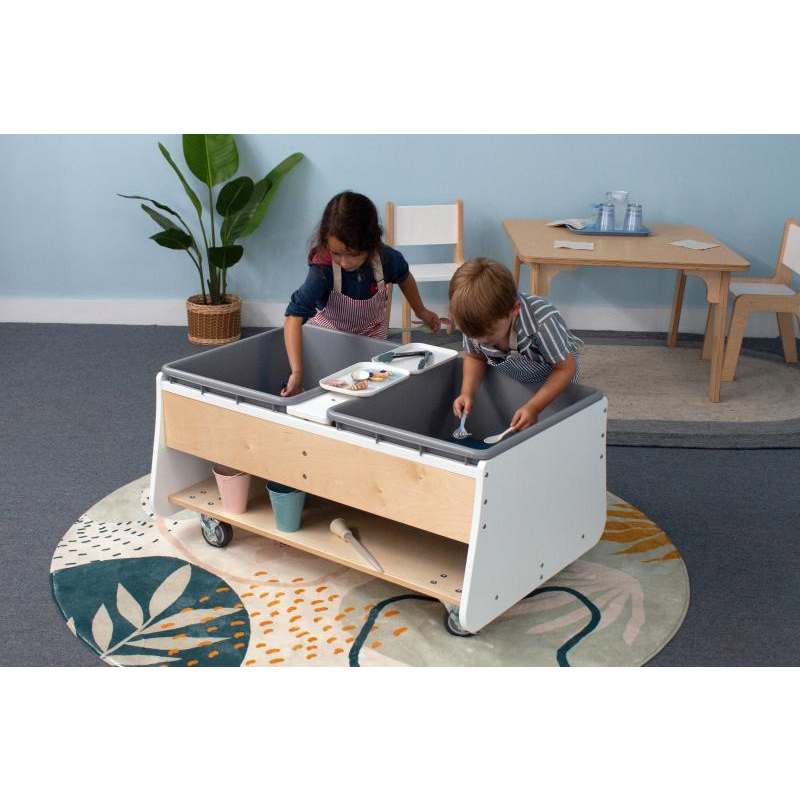 Whitney Brothers Mobile Two Tub Sand and Water Table (WB4048) - two kids using the table for sensory activities in a classroom