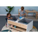 Whitney Brothers Mobile Two Tub Sand and Water Table (WB4048) - two kids using cups and sensory materials at the table