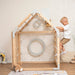 wooden_climbing_playhouse_boy_in_white_playing