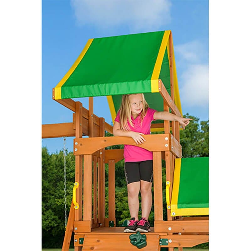 woodlands_wooden_swing_set_little_girl_on_top