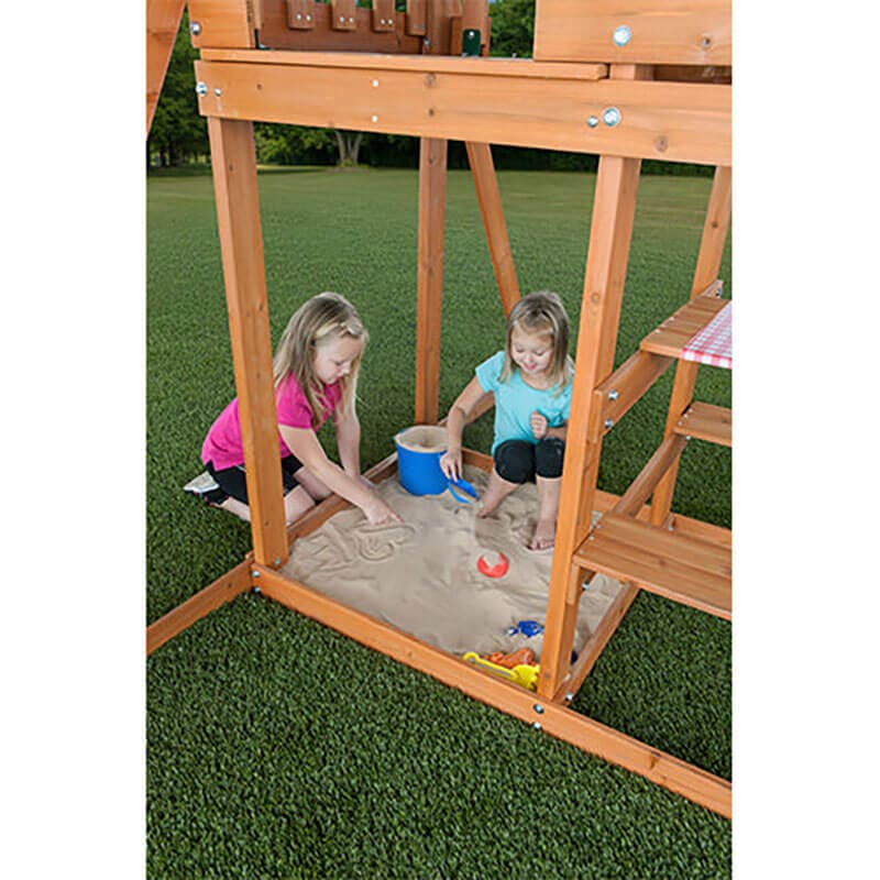 woodlands_wooden_swing_set_little_girl_plying_sand